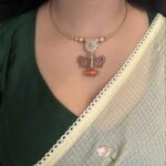 Pastel pink and kemp stone Kolhapuri Hasli set