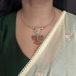 Pastel pink and kemp stone Kolhapuri Hasli set